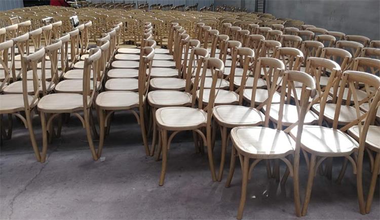 unpainted wooden x back chairs