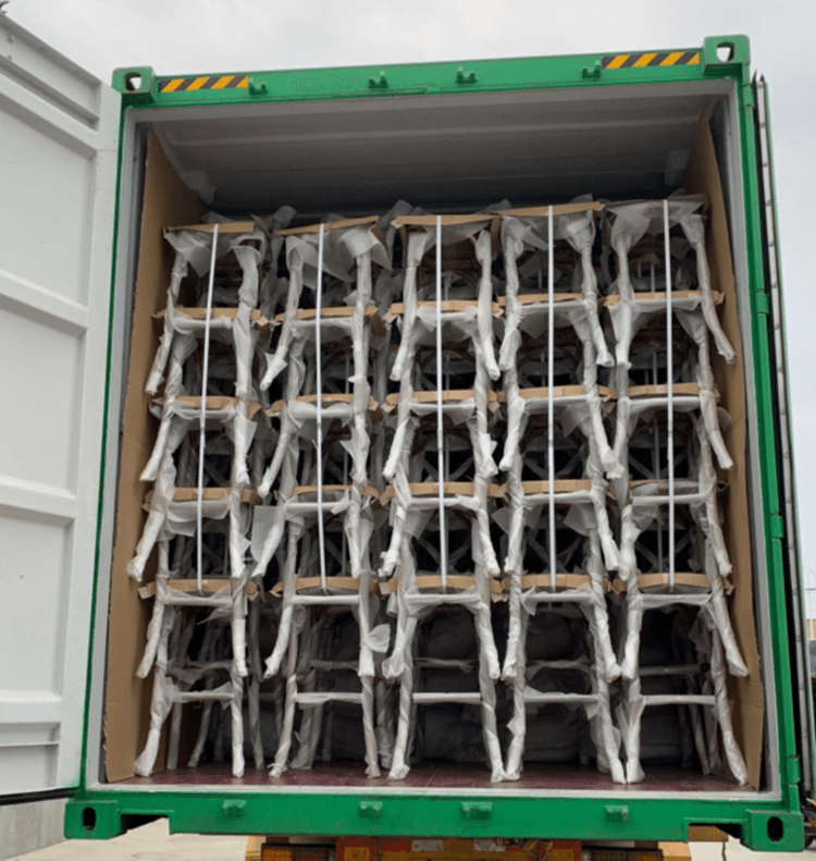 loading container of crossback chairs