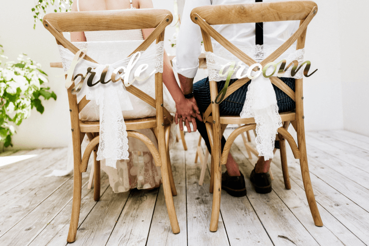 bride and groom wedding chair